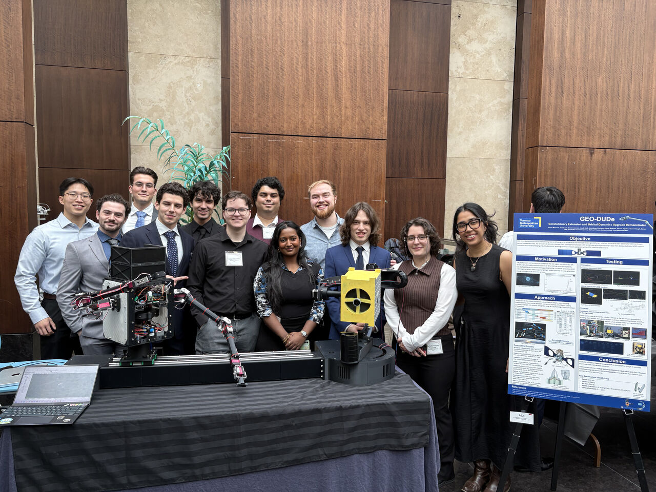 Aidan and the GEO-DUDE capstone team at their project showcase